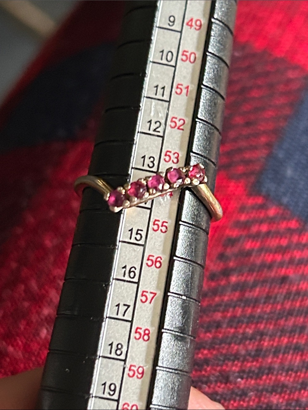 Vintage sterling silver dainty ring with five rubies.
